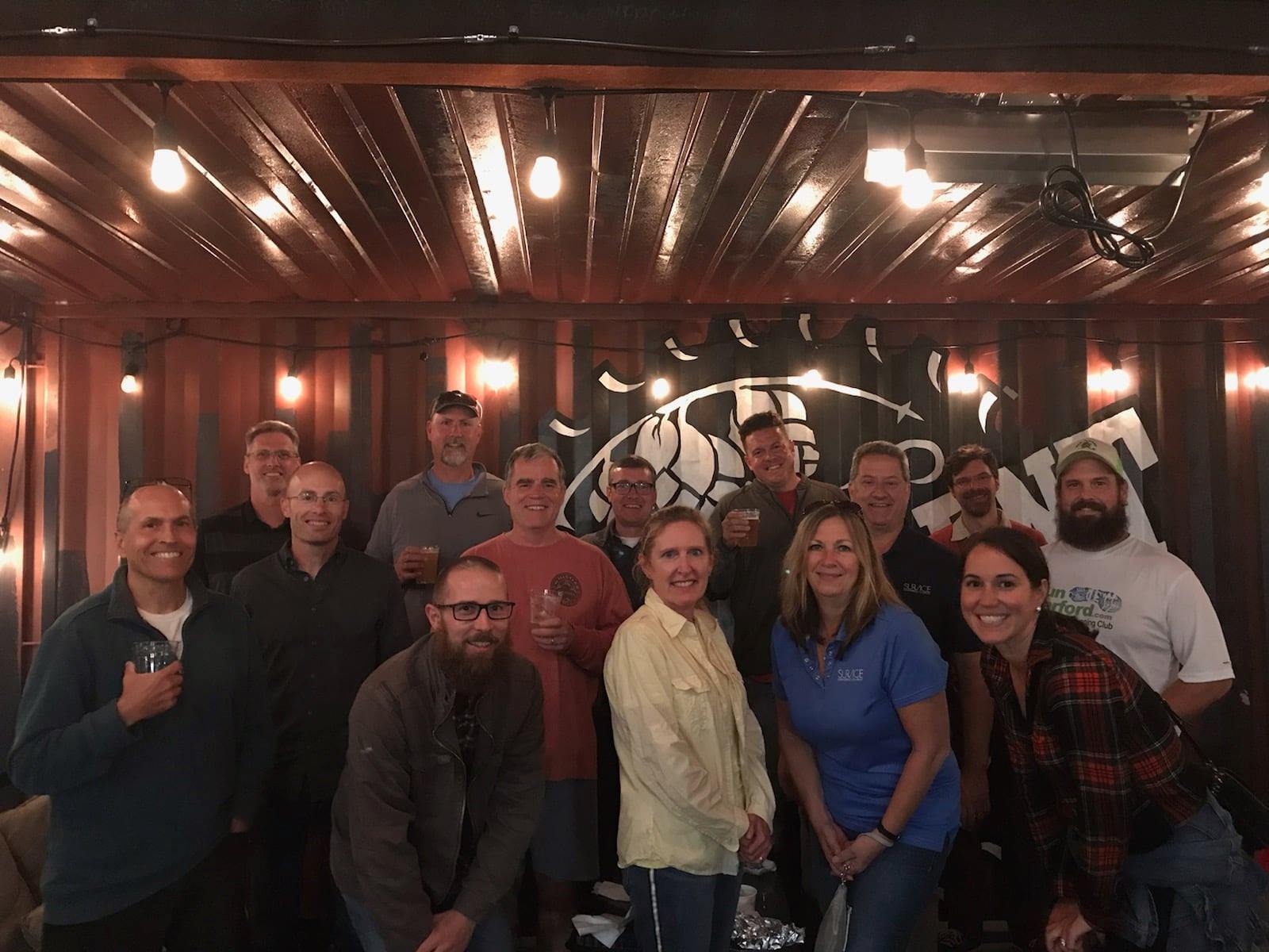 Group shot of SURVICE employees at Independent Brewing Company