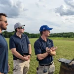 SURVICE employees flying our drone at the Drone Drop Fundraiser.