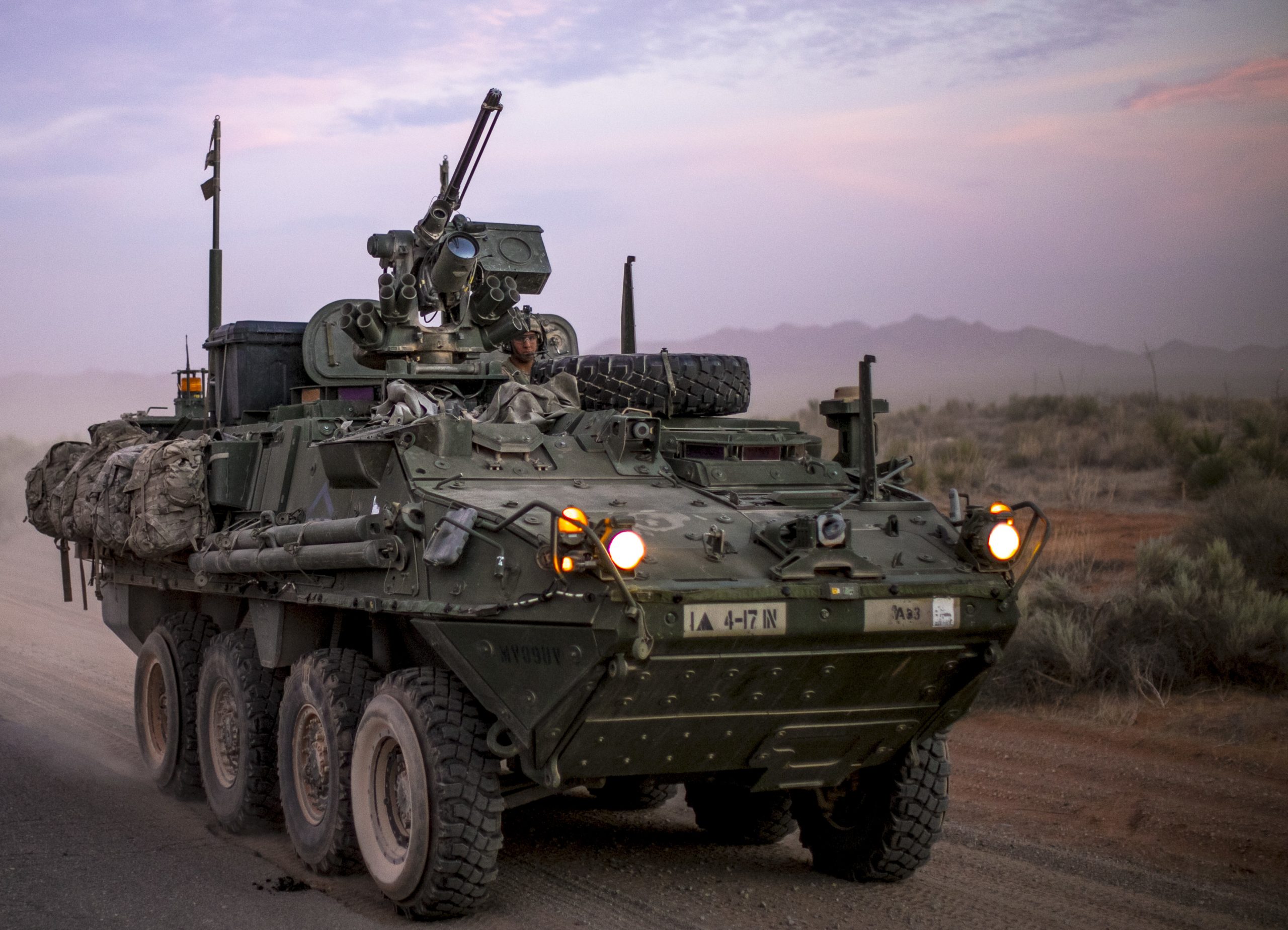 STRYKER assigned to 1st Brigade Combat Team, 4-17 Infantry Battalion passed the Combat Aviation Brigade's convoy on the way to Division's wide Iron Focus field exercise.