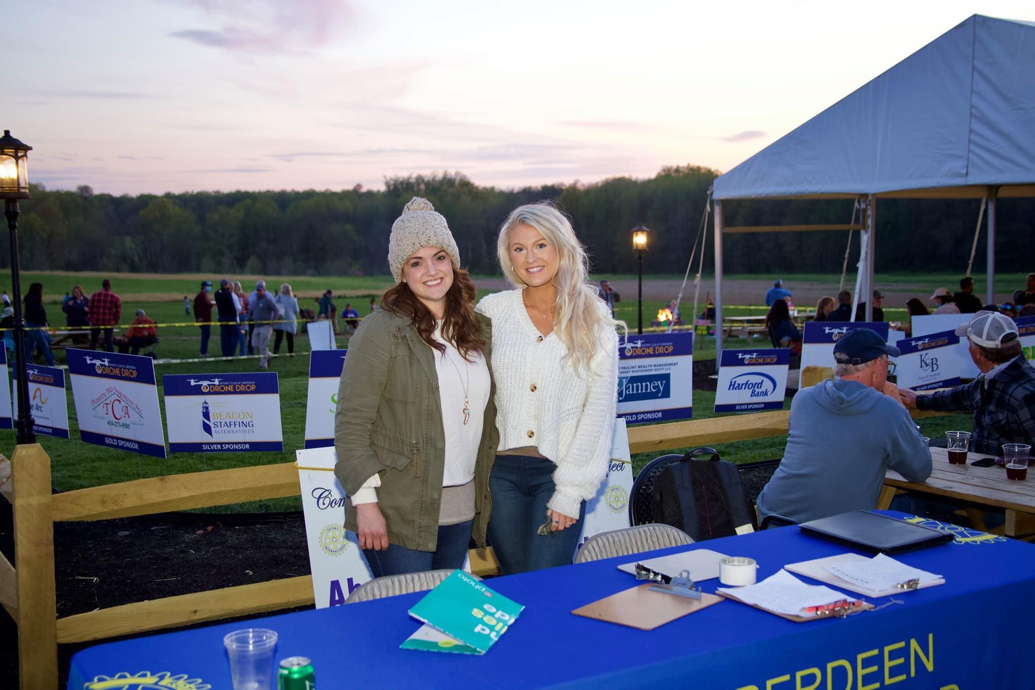 SURVICE employees, Melissa and Tori, helping at the event
