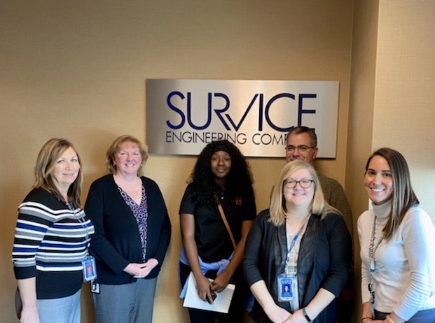 SURVICE Corporate employees with Edgewood High School student participating in Academy of Finance Program.