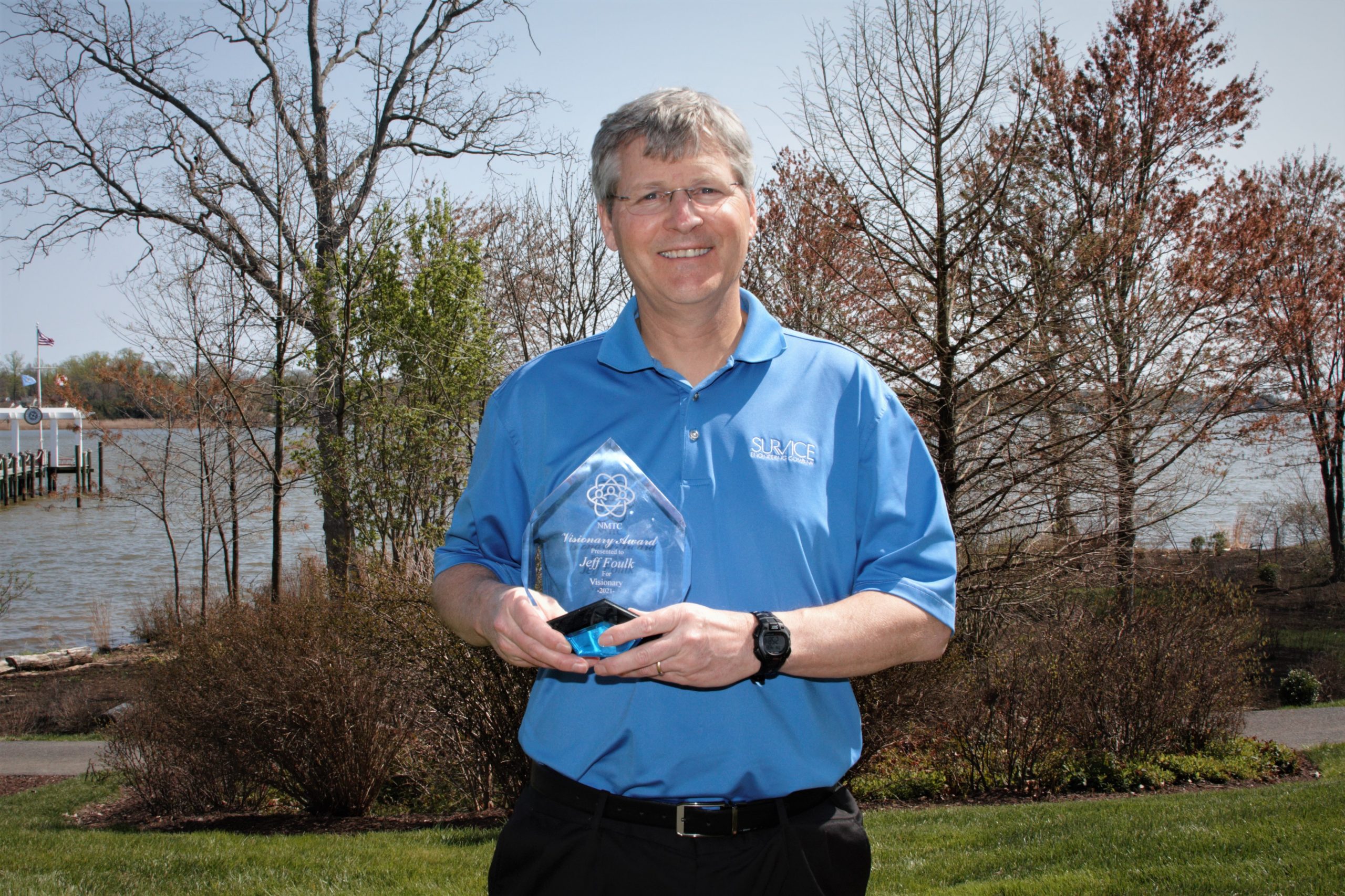 SURVICE CEO, Jeff Foulk with his NMTC Visionary Award.
