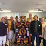 LeAnne celebrating the anniversary of the Lions Club of Perryville.