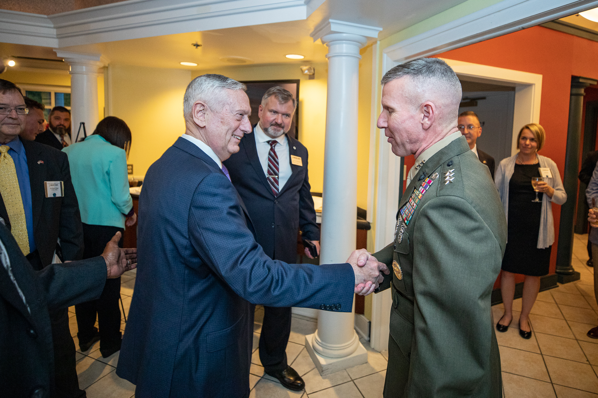 General Mattis shaking hands with generals at dinner